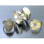 Collection of four Silver rings of various designs