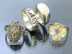 Collection of four Silver rings of various designs