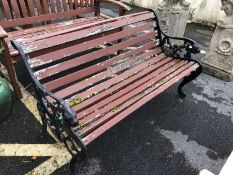 Garden bench with metal ends and lion arm rests, approx 125cm in length