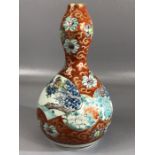 Chinese double gourd vase with six figure character mark to base, with bird design on orange ground,