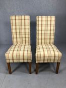 Pair of modern high backed upholstered chairs