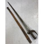 Officers sword bearing Royal Coat of Arms & patent solid hilt by HENRY WILKINSON and also marked