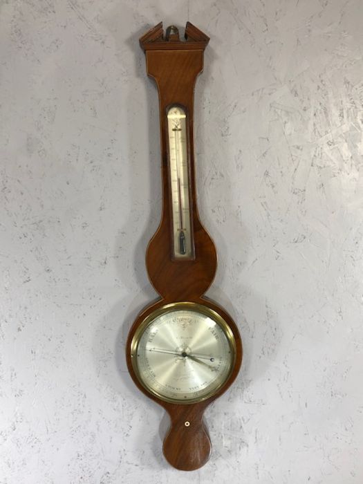 Mahogany Wheel barometer, the 21cm dial signed G Bianchi, Ipswich, the neck set with an alcohol
