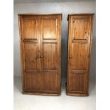 One double and one single pine free standing wardrobe, each on castors, the larger approx 95cm x