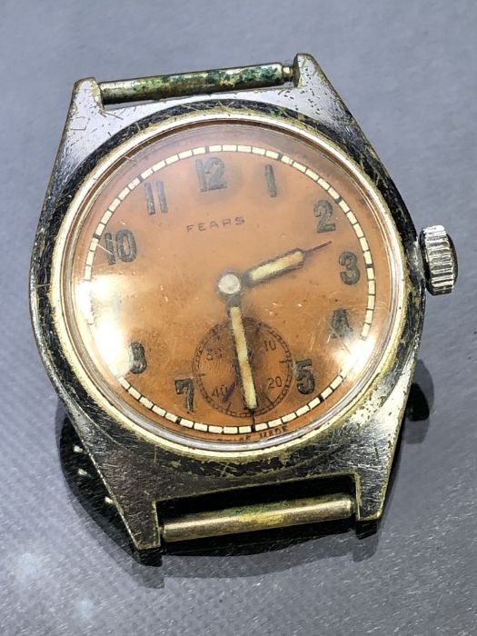 Vintage wristwatch by FEARS of Bristol Orange face with subsiduary seconds dial at 6 o'clock.