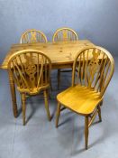 Pine kitchen table with four wheelback chairs, table approx. 120cm x 80cm