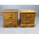 Two low pine bedside tables each with two drawers