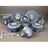 Collection of blue and white Wedgwood Jasper Ware to include lided dishes, small vases, plates,