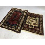 Two vintage woollen rugs, the larger approx 134cm x 100cm