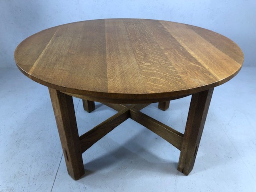 Circular Arts and Crafts heavy oak dining table by STICKLEY BROTHERS with four legs and cross