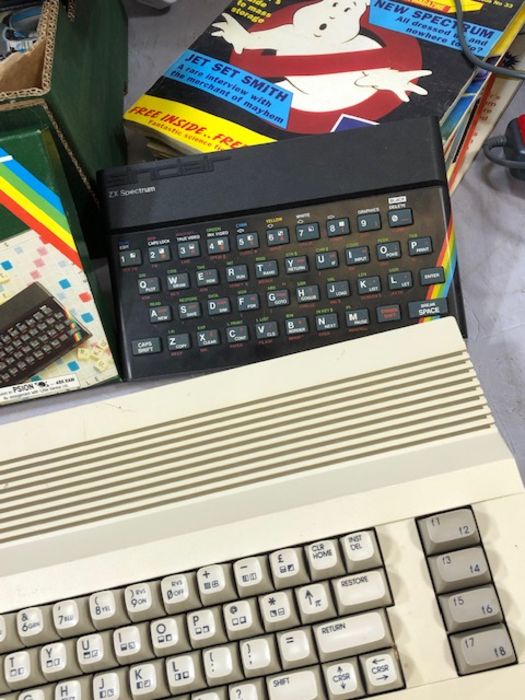 Collection of vintage computer gaming items to include a Commodore 64 and a collection of games - Image 2 of 7