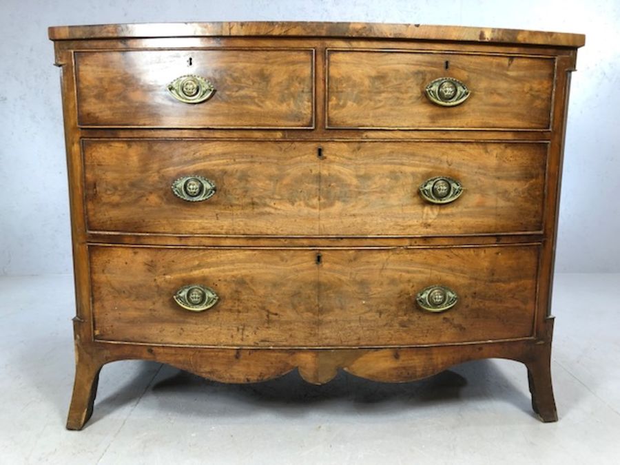 Victorian bow-fronted four drawer chest of drawers on splay front feet, approx 115cm x 55cm x 90cm - Image 3 of 8