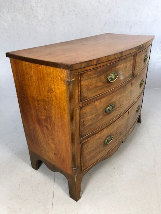 Victorian bow-fronted four drawer chest of drawers on splay front feet, approx 115cm x 55cm x 90cm - Image 6 of 8