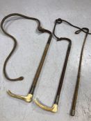 Two silver topped and antler handled riding crops and one other