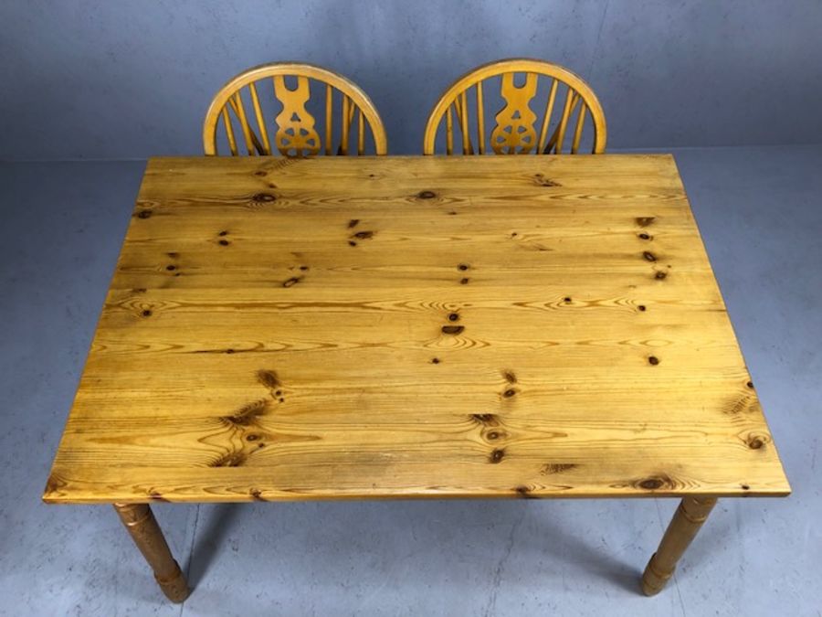 Pine kitchen table with four wheelback chairs, table approx. 120cm x 80cm - Image 3 of 3