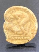 Small fragmentary artefact, circular, depicting two figures in an erotic scene, possibly Greco