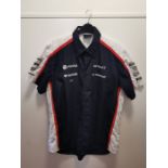 Two genuine Formula 1 shirts, kindly donated by a senior engineer involved in Formula 1, with letter