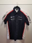 Two genuine Formula 1 shirts, kindly donated by a senior engineer involved in Formula 1, with letter