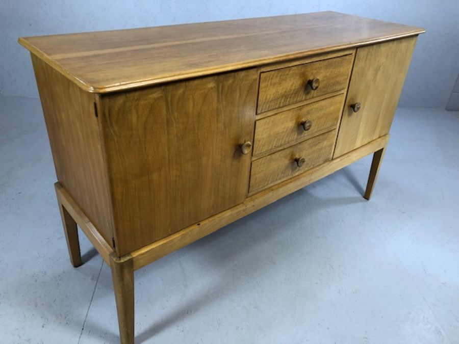 Mid Century walnut sideboard by GORDON RUSSELL of Broadway, with three drawers flanked by cupboards, - Image 4 of 7