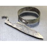 Two bronze artefacts, possibly Viking, a bracelet approx 5cm in diameter and a small razor approx