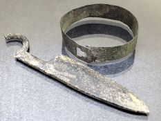Two bronze artefacts, possibly Viking, a bracelet approx 5cm in diameter and a small razor approx