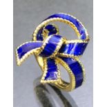 18ct Gold and Blue enamel tied ribbon design ring size 'J' & total weight 6.8g