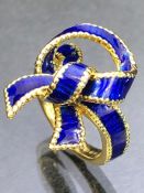 18ct Gold and Blue enamel tied ribbon design ring size 'J' & total weight 6.8g