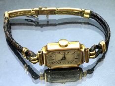 Vintage 9ct Gold cased Art Deco style watch on leather strap (approx 10.6g)