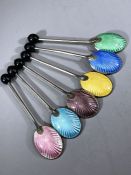 Silver hallmarked coffee spoons with coloured enamel scallop shell designed backs hallmarked for