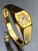 18ct Gold ring set with a single diamond in a square mount size 'T' & 7.7g