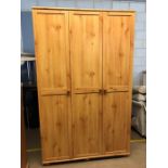 Modern pine three door wardrobe by Alstons of Ipswich, approx 114cm x 53cm x 187cm tall