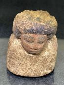 Wooden carved torso, possibly Egyptian in origin, a male painted with black and light brown pigments