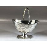 Victorian Silver Hallmarked swing handled basket on pedestal foot Hallmarked for Sheffield 1881 by