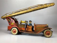 Vintage toys: An early 20th century German tin-plate fire engine with clockwork mechanism, approx