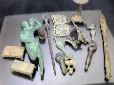 Collection of artefacts, possibly metal detecting finds, mostly Roman, to include statuette bases/