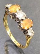 18ct Gold ring set with Oval faceted Citrines and a trio of platinum set Diamonds size 'N'