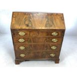 Antique bureau with four drawers and fall front writing slope revealing pigeon holes, approx 92cm