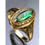 10ct Gold ring in the marquise style with interesting starburst effect green stone 9.6 x 4.3mm