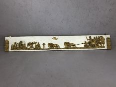 Carved gilded plaster on wood pelmet depicting a Roman chariot being pulled by lions and flying