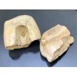 Two fragments of terracotta tile, possibly Egyptian in origin, one depicting the face of a