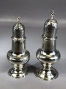 Two Similar Hallmarked Victorian sugar shakers marks for London 1760 & 1769 the largest approx 13cm