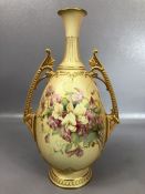 Royal Worcester blush porcelain two handle vase, shape 1936, gilt highlighted with flower sprays