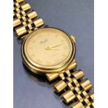 SOUDE INTERNATIONAL; a ladies' vintage 9ct gold wristwatch, on 9ct gold bracelet total weight 33.2g