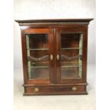 Mahogany display cabinet with glass doors, drawer under, with brass furniture and original key and