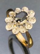 9ct Gold Daisy style ring with central faceted Sapphire and surrounded by 10 diamonds size approx '