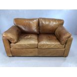 Two seater brown leather sofa, approx 160cm in length x 100cm deep