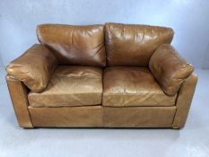 Two seater brown leather sofa, approx 160cm in length x 100cm deep