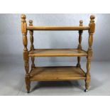 Three tier tea/serving trolley on castors with turned legs, approx 83cm x 43cm x 98cm tall (max)