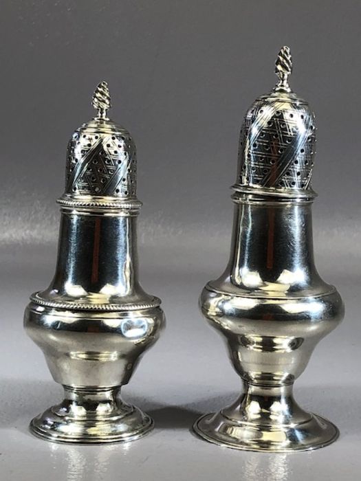 Two Similar Hallmarked Victorian sugar shakers marks for London 1760 & 1769 the largest approx 13cm - Image 2 of 6