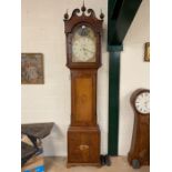 Longcase grandfather clock with painted face depicting Nelson, brass finials and column supports